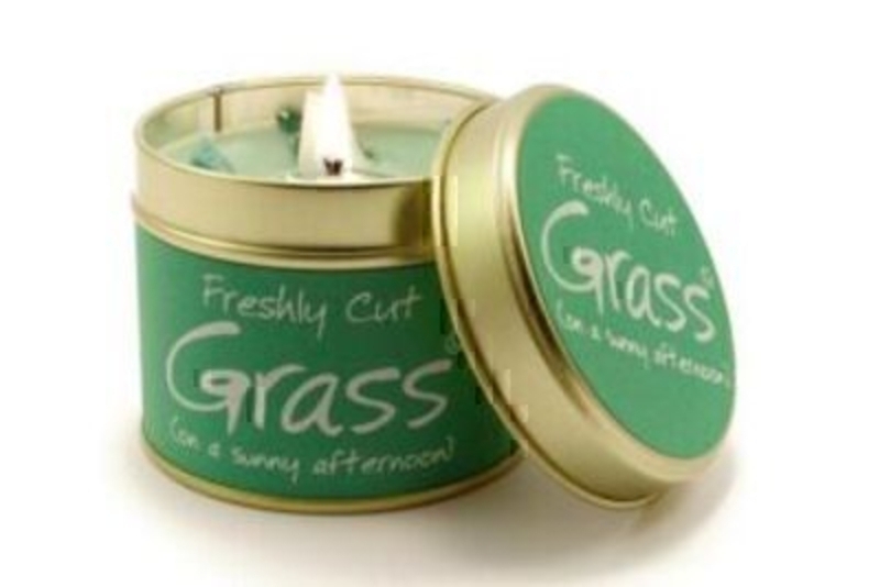 Let Lily Flame scented candles transport you to a different place. Cut Grass; on a Summer Afternoon. This scent is for some reason, very popular with men. Clean, light and very realistic. Notice how the wording looks like the painted lines on a tennis c